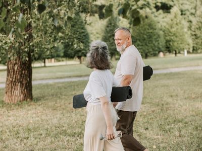 Close up of a yoga mat and a water bottle.